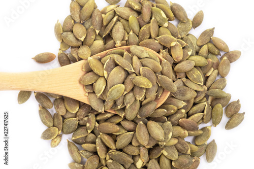 Pumpkin seeds on a white background