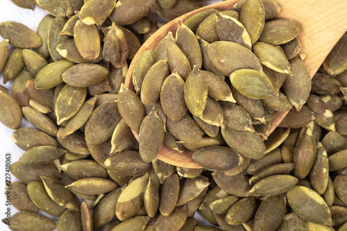 Pumpkin seeds on a white background