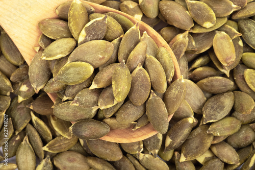 Pumpkin seeds on a white background