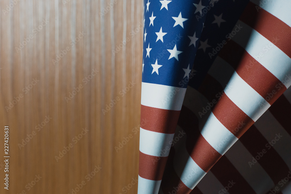 The Veterans Day concept united states of America flag on wood background. The Veterans Day concept united states of America flag on wood background.