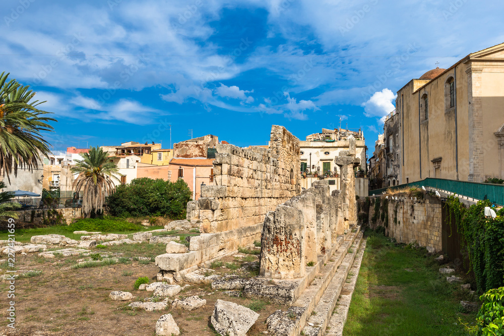  Temple of Apollo. One of the most important ancient Greek monuments on Ortygia, in front of the Piazza Pancali in Syracuse, Sicily, Italy.