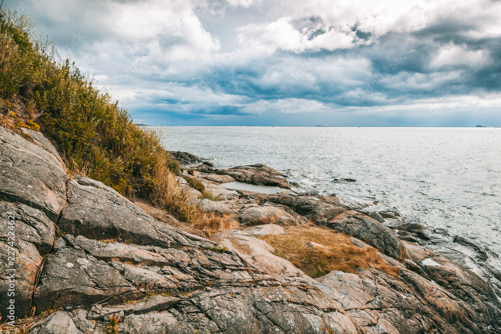 Beautiful seascape, the stone coast of the sea on the islands of Finland. The nature of Northern Europe