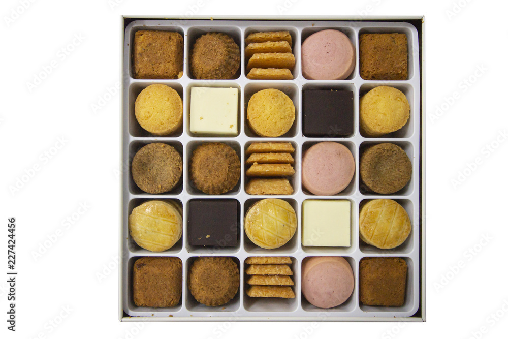 Isolated white background of many cookies in the box with clipping path. Isolated white background of many cookies in the box with clipping path.