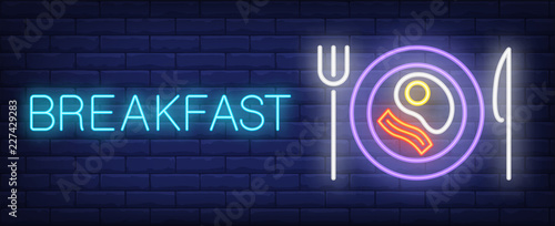 Breakfast neon sign. Ham and fried egg on plate. Night bright advertisement. Vector illustration in neon style for business breakfast, cafe, restaurant, hotel