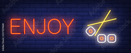 Enjoy neon sign. Chopsticks holding sushi roll. Asian restaurant, Chinese food, seafood. Night bright advertisement. Vector illustration in neon style for food, service, traditional cuisine