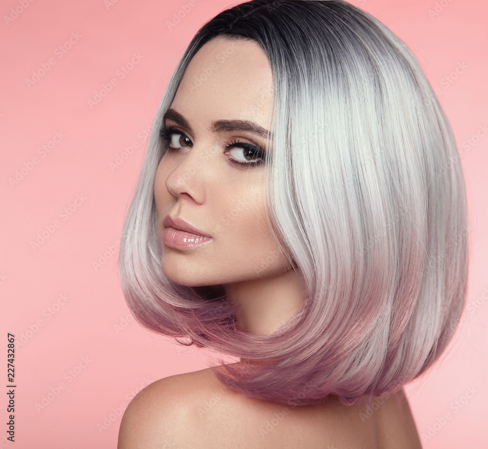 Girl Portrait of Ombre bob short hairstyle. Beautiful hair coloring woman.  Trendy puprle haircut. Blond model with short shiny haircuts isolated on  pink Background. Makeup. Beauty Salon. Stock Photo | Adobe Stock