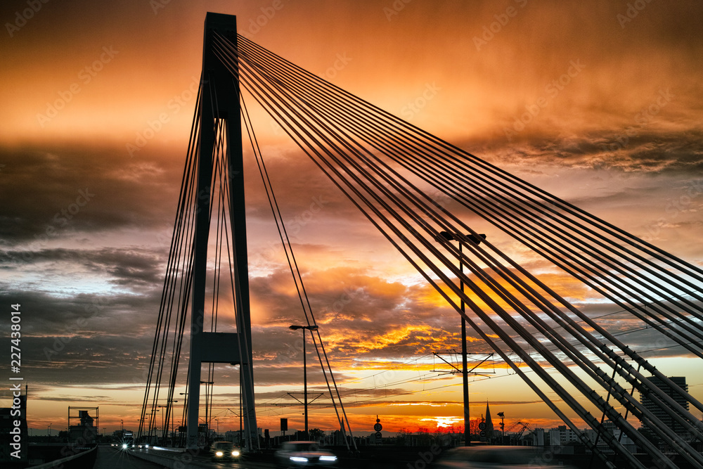 Obraz premium Mannheim Ludwigshafen Germany Bridge red dramatic sky