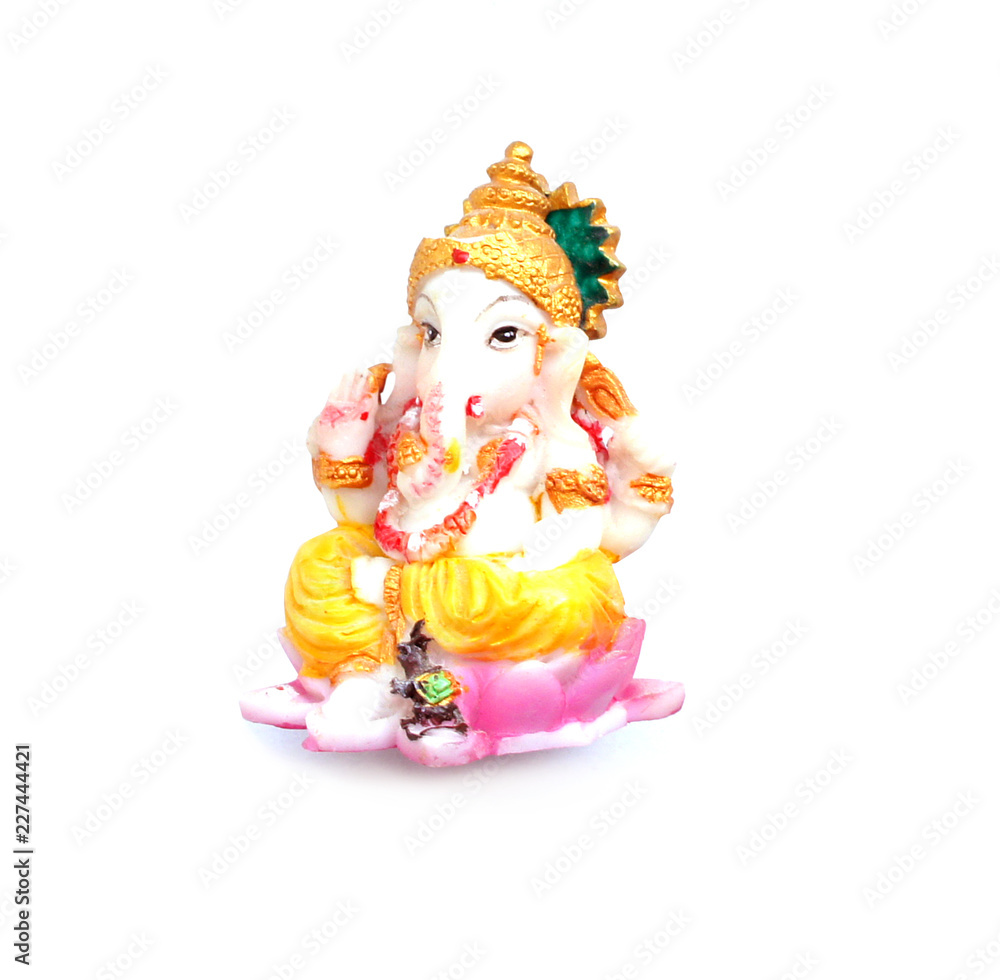 Decorative Ganesha statuette isolated on white background. 