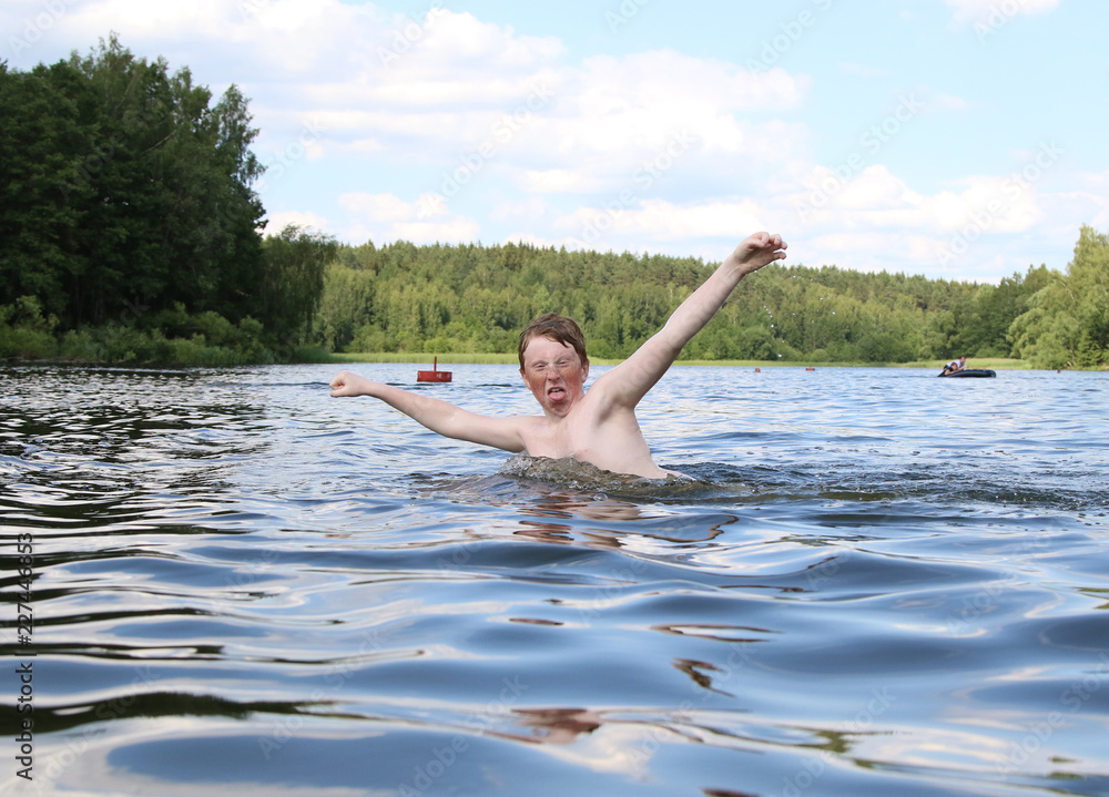Fototapeta premium Boy play in water