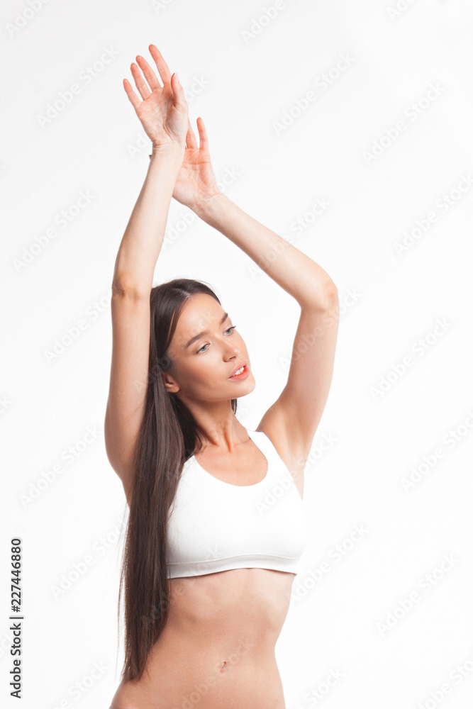 Slim young woman in underwear on white background Slim young woman in underwear on white background
