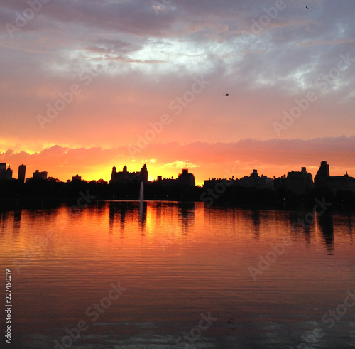 Gorgeous sunset at reservoir in Central Park, New York City, NY