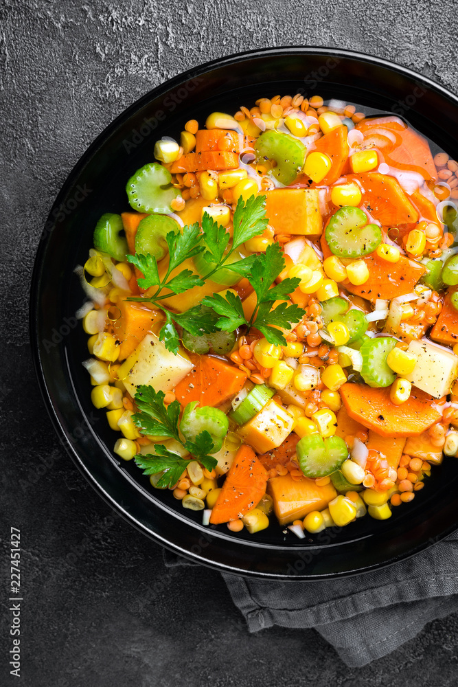 Healthy vegetarian vegetable soup with lentil and vegetables. Lentil soup with vegetables Healthy vegetarian vegetable soup with lentil and vegetables. Lentil soup with vegetables