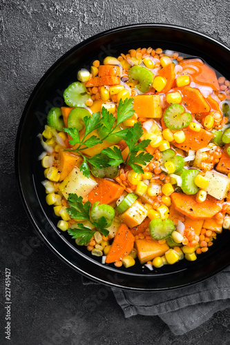 Healthy vegetarian vegetable soup with lentil and vegetables. Lentil soup with vegetables