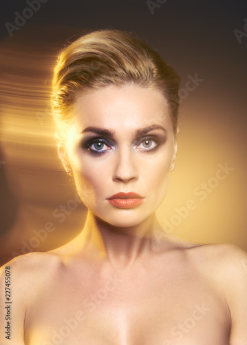 Creative portrait of a young woman with multi-exposure.