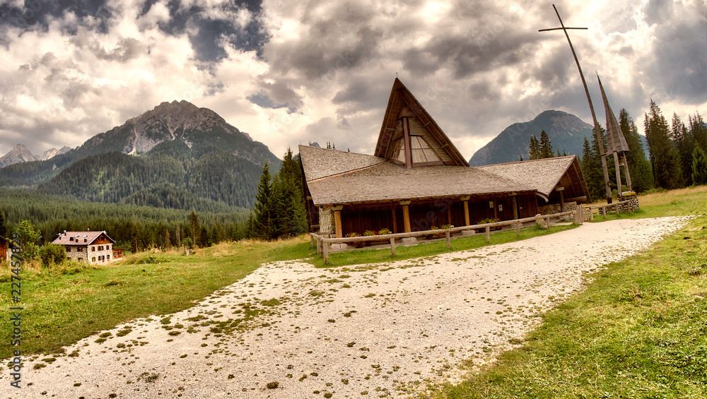 Small church on european alps in summer time