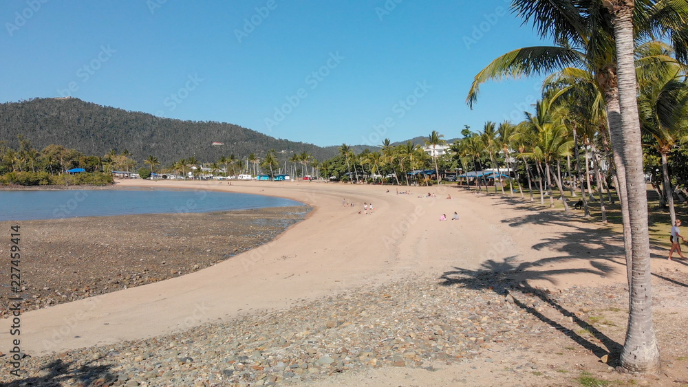 Beautiful coastline and cityscape of Airlie Beach, Queensland. Aerial view from drone Beautiful coastline and cityscape of Airlie Beach, Queensland. Aerial view from drone