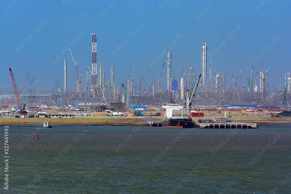 Construction of an oil refinery plant and petroleum terminal on the sea shore in progress. Pengerang Deepwater Terminal.