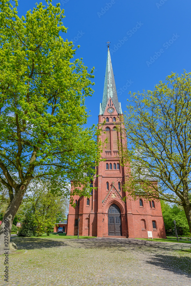 View of the Ohmsteder Kirche, Oldenburg, Germany. Vertical. Copy space for text.