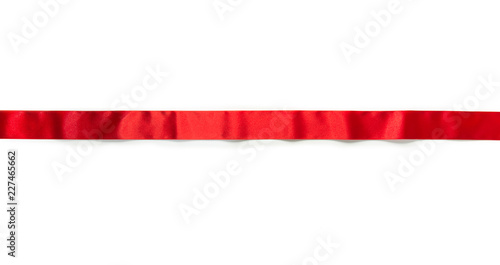 Free Download Extending simple red ribbon with typical ripples or wrinkles of a silky or satin ribbon , isolated on white. - GFXLoad
