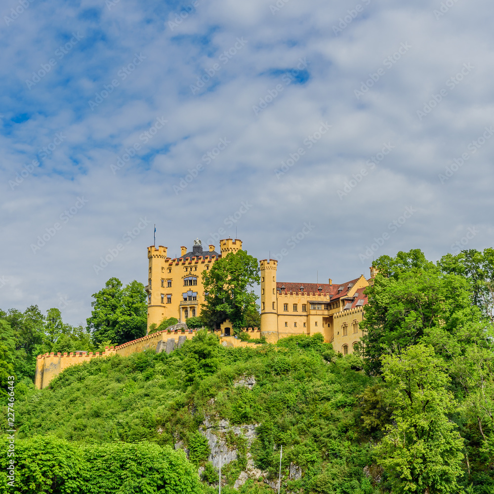 BAVARIA, GERMANY - MAY 23, 2018: Castle Schloss Hohenschwangau or Upper Swan County Place is a place in the village of Hohenschwangau near Fussen. Copy space for text.