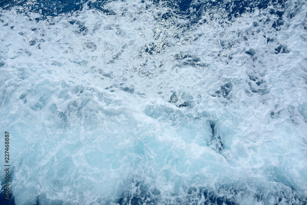 sea water with foam and waves