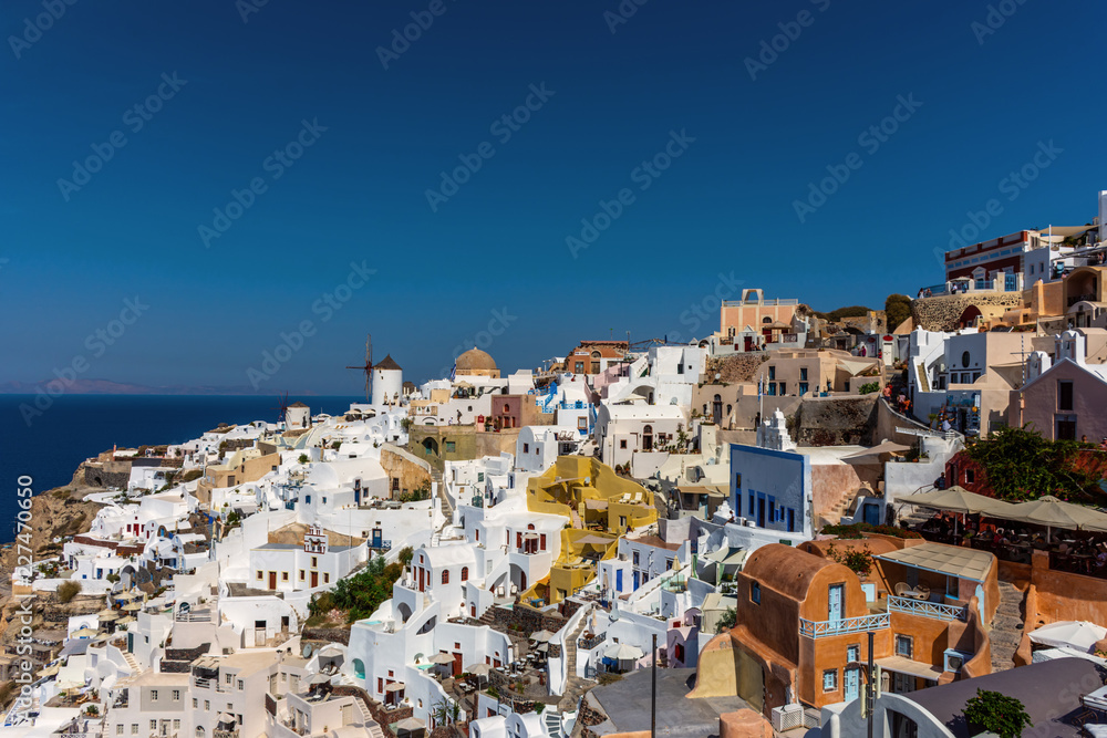 Santorini, Greece. Picturesque view of traditional cycladic Santorini houses on cliff