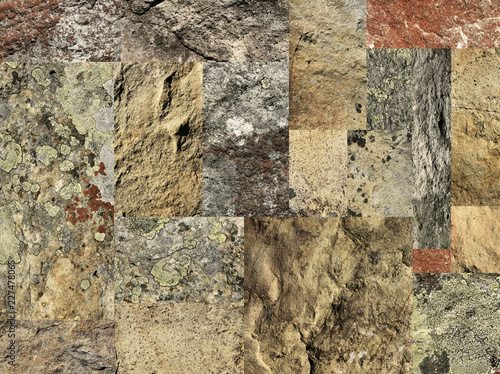 Fragment of a decorative stone wall with lichen on the surface.