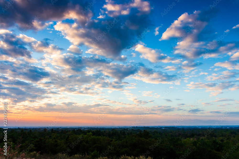 colorful dramatic sky with cloud at sunset.