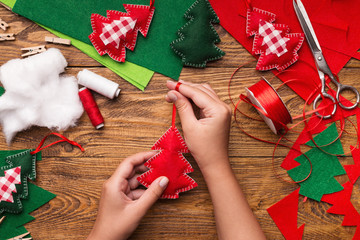 Making of handmade christmas toys from felt