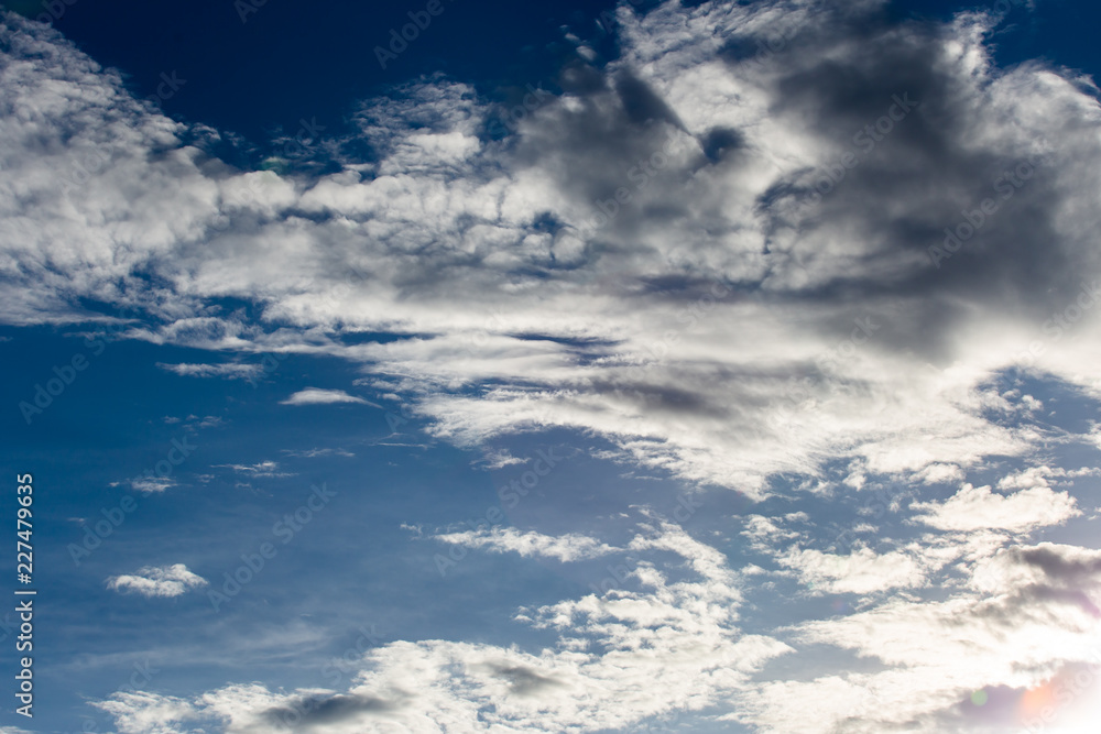 Obraz premium colorful dramatic sky with cloud at sunset.