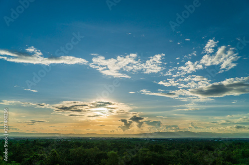 colorful dramatic sky with cloud at sunset.