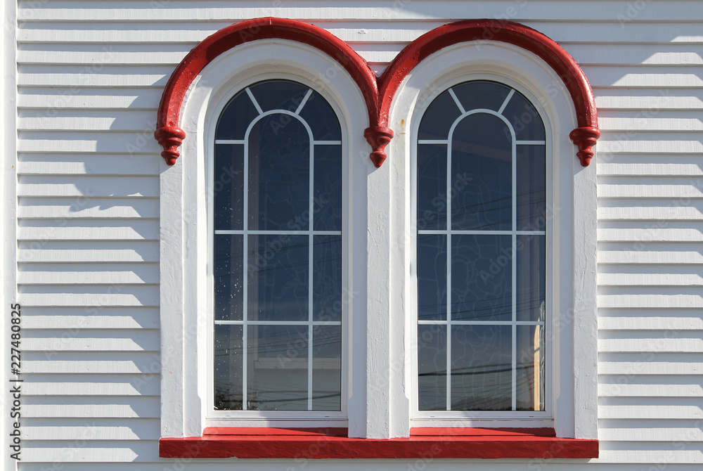 Fototapeta premium detail of historic church double arched window, Placentia, Newfoundland, Canada