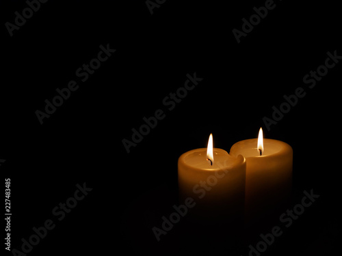 Two candles in the dark