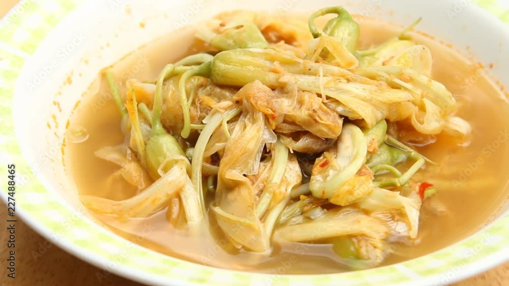 Cooking sour katuri flower curry , or Kang Som Dok-Khae, Thai food Cooking sour katuri flower curry , or Kang Som Dok-Khae, Thai food