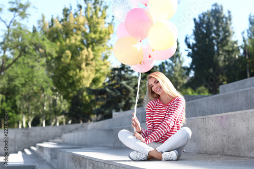 Beautiful young woman with ...