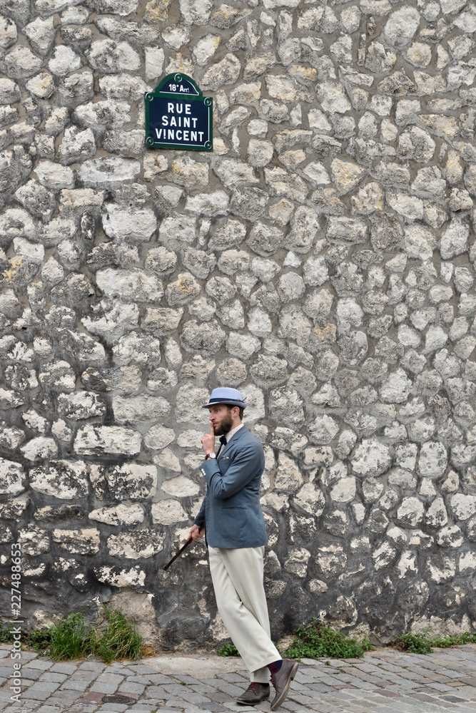 Man in front of a wall Man in front of a wall