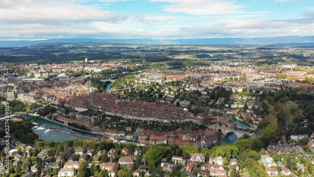 Aerial panoramic view of cityscape of Bern, historic city center above crook in turquoise river Aare - landscape panorama of capital city of Switzerland from above, Europe Aerial panoramic view of cityscape of Bern, historic city center above crook in turquoise river Aare - landscape panorama of capital city of Switzerland from above, Europe