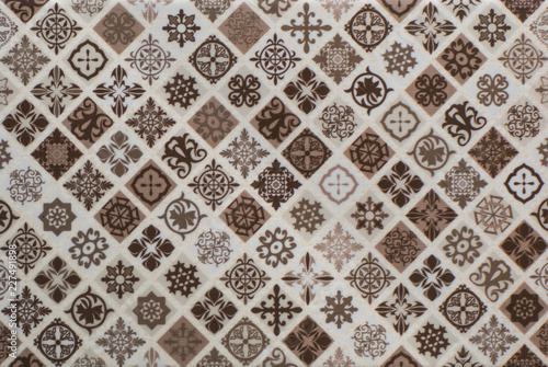 Tiled geometric mosaic interior wall