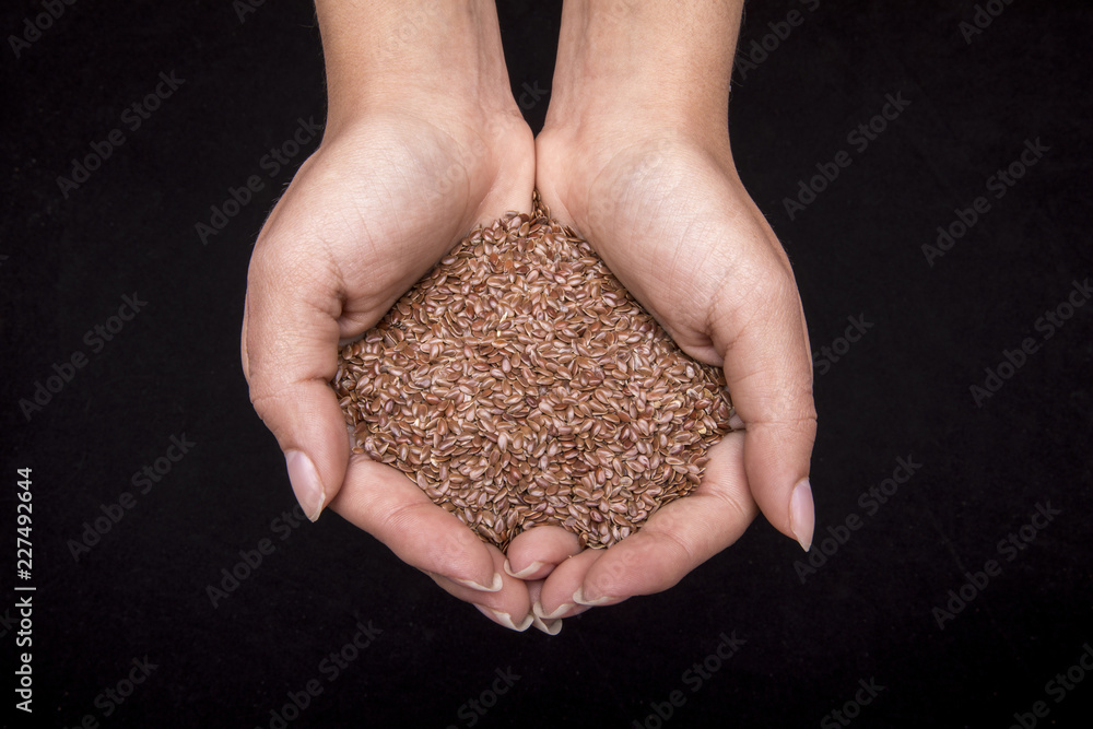 woman´s hands with differents cereals woman´s hands with differents cereals