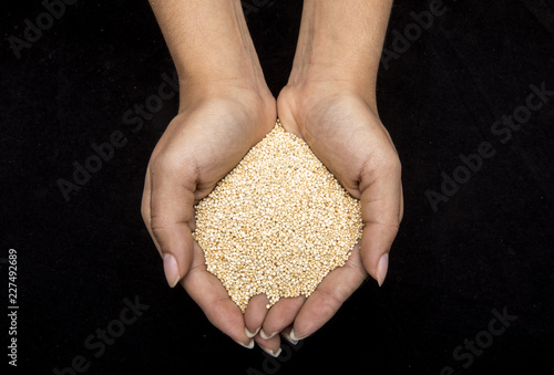 woman´s hands with differents cereals