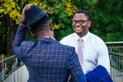 two african american business partners go towards the airport for a business meeting international Conference