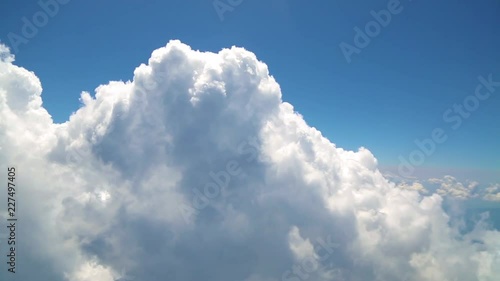 Flying with clouds, watching clouds from airplane window