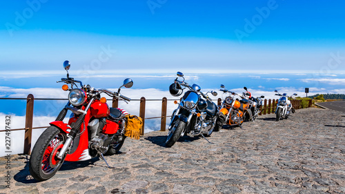 Spectacular cruise and panorama views with strongly motorcycle team. Having fun riding the empty road on a motorcycle tour photo