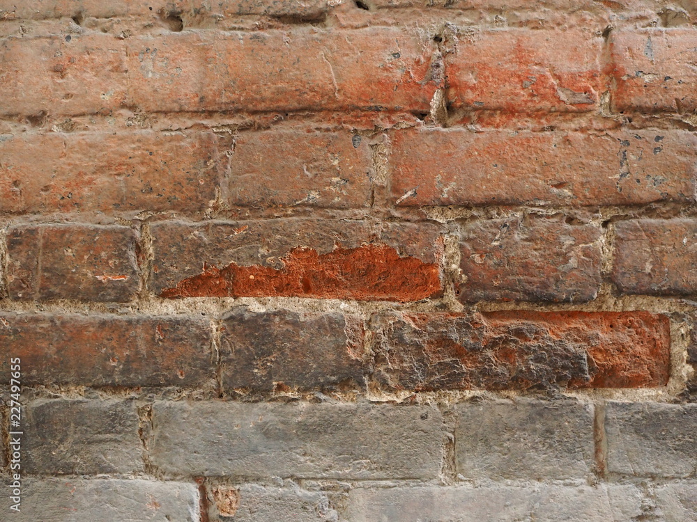 close-up wall of red brick