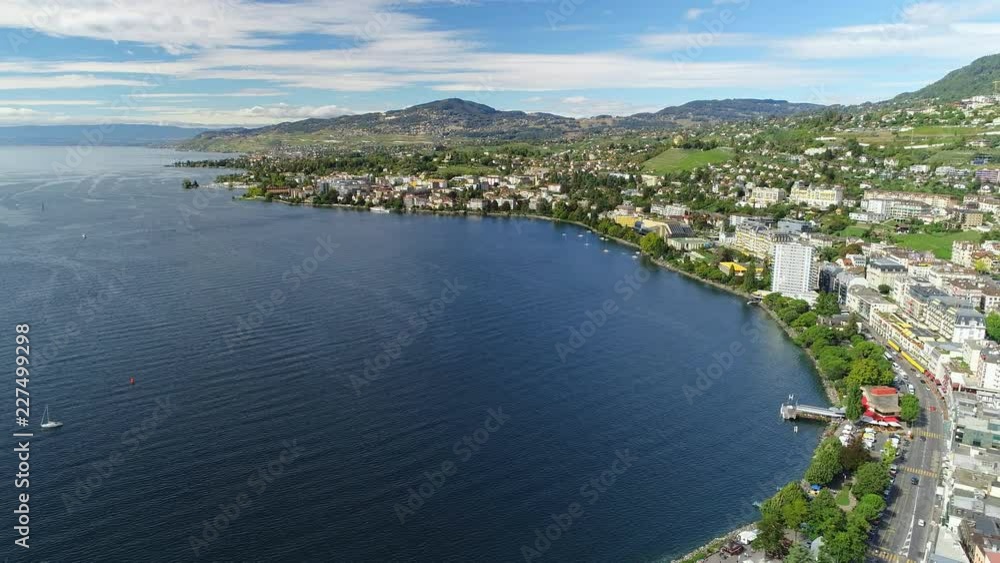 Aerial panoramic view of city of Montreux, resort town by Geneva Lake (Lac Leman), late summer - landscape panorama of Switzerland from above, Europe Aerial panoramic view of city of Montreux, resort town by Geneva Lake (Lac Leman), late summer - landscape panorama of Switzerland from above, Europe