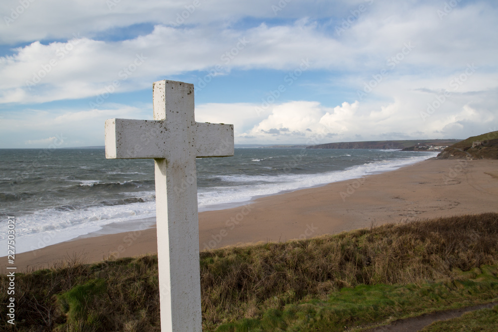 The cross near loe bar in cornwall england uk near the coast 