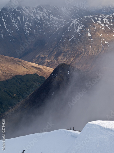 Approaching the summit of Sgorr Dhearg with Glencoe behind photo