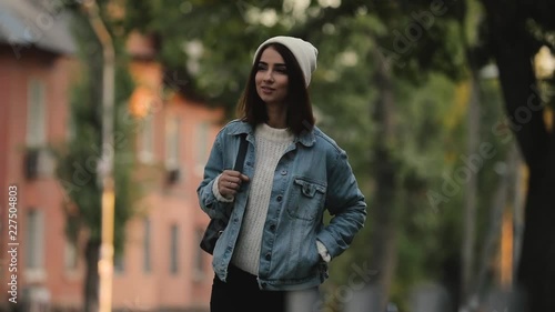 Wallpaper Mural Woman walking through street at the autumn day Torontodigital.ca