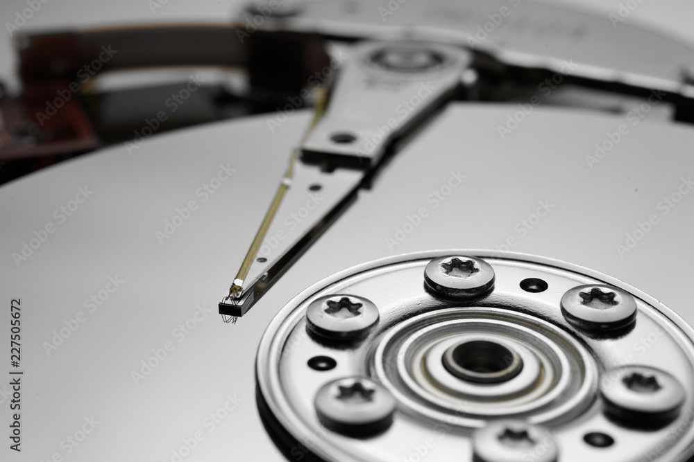 Close up of hard disk's internal mechanism hardware Close up of hard disk's internal mechanism hardware