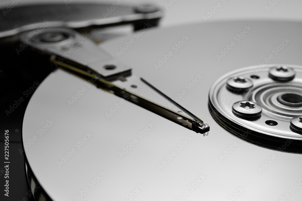 Close up of hard disk's internal mechanism hardware Close up of hard disk's internal mechanism hardware